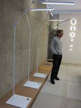 &Costa offered a fleet of LED floor lights and sculptural wall sconces.