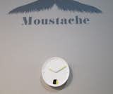 Paris design company Moustache had but one new offering on view: this cute clock, with a yellow panel that swings back and forth to mark the seconds.