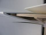 Here's a detail showing how the Corian skin fits over the plywood base.