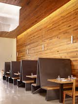 An old warehouse was converted into the restaurant. The walls are made of reclaimed oak from former whiskey barrels.