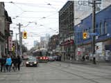 Next up was a trip down Queen Street West between Bathurst and Ossington streets. In this picture, a regular Toronto sight: the TTC streetcars.  Photo 8 of 16 in Touring Toronto, Part 1 by Miyoko Ohtake