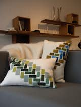 Topping the Cubert Love Seat by 608 Design is a pair of Storeys Cushions by Kerry Croghan.