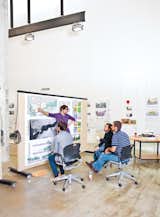 The mobile furniture allows impromptu presentations and discussions throughout the building.