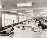 Here we see the drafting room at the Ford Motor bomber factory in Willow Run, Michigan, in 1942. The building was designed by Albert Kahn Associates.

Photograph by Hedrich-Blessing. CCA Collection Gift of Federico Bucci. Canadian Centre for Architecture, Montreal. Gift of Federico Bucci. © Chicago History Museum.  Photo 4 of 6 in Design in Uniform at CCA by Aaron Britt