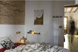 A toxin-free environment was especially important in the bedroom, so the couple incorporated organic cotton, latex pillows and paints made without volatile organic compounds (VOCs).  Photo 12 of 14 in Green Living in Barcelona