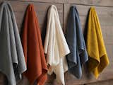 Organic cotton towels, available in eight neutral and jewel-tone hues.