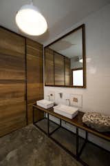 The elegant design extends through the washrooms. Collaborating on the project was interior designer Maria Eugenia Alvarez-Calderon.