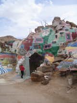 Here's a look at another portion of Salvation Mountain next to the main mountain. It's a kind of warren of rooms and underground caves full of colors and strange objects.  Photo 8 of 21 in Salvation Mountain and Slab City by Aaron Britt