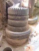 Here's a good look at the pillars of adobe-filled tires that make up much of the vertical structure of the place. It's a pretty impressive bit of untrained building, and Mike told me that the paint acts both as a striking decorative element, but also seals the adobe from the rain. What little rain they get anyway.