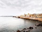 Gunnar Knechtel Photography, Italy, Sicily, Town: Syracuse, Island of Ortigia. The house of Francesco Moncada,Town houses and sea wall Syracuse Sicily. Syracuse is famous for its rich Greek history culture amphitheatres architecture and as the birthplace of Archimedes photographed on the 27+28,12.2010 for Dwell Magazine  Search “waterfront” from Less Is Amore