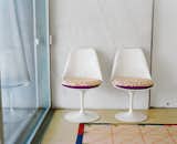needlepoint seating pads on the Tulip chairs