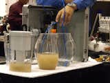 Few things draw a crowd like a demonstration. Everpure showed the differing results of running dirty water through a standard pitcher filter versus through the Everpure undercounter filtration system.  Photo 2 of 7 in KBIS 2011: Part 3 by Miyoko Ohtake