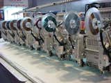 No, this isn't a supercomputer—it's a row of embroidery machines.