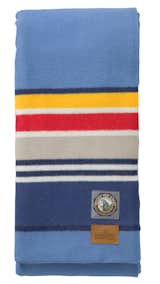 Cool blues and even more stripes mark this Yosemite blanket. This one veers a bit into beach towel territory if you ask me, but the muted tones could help anchor a splashy interior.