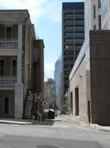 To find some shade, we walked down some of Austin's narrow downtown alleys. In the distance is the Frost Bank Tower.
