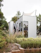 The home’s metal cladding is Pac-Clad, a material typically used for roofs.