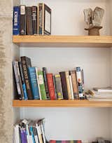 A close-up of the bookshelves made of MDF clad in bamboo veneer.