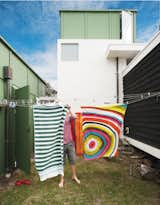 Gerald wanted the siting of the buildings to appear loose, like a campsite. The gap between the living room and the bedroom wing accommodates a washing line.  Search “greenbelt%20line” from Bach to the Beach