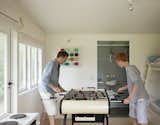 Will and Tom enjoy their other bedroom essential: a foosball table.  Photo 21 of 30 in Bach to the Beach