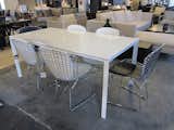 Faux Bertoia dining chairs for $150.  Photo 8 of 14 in Visiting H.D. Buttercup by Jaime Gillin