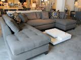 Here's a nice-looking sectional, priced at $3,795. I'd lose the patterned pillows.