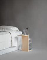 For people who want more than a single glass of water by their bed, this nightstand by Leon Rasmeier should do the trick. A five-gallon jug with integrated pump ensures you'll never wake up parched again.