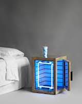 Shawn Maximo's nightstand is made from pressure-treated wood, MDF, glass, mirror, neon, and brass. It's intended for the display of illicit objects, or to act as a "mini-convenience store beside the bed," said Maximo.  郭于甄’s Saves from The Nightstand, Reinvented