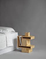 RO/LU's cubist plywood nightstand was inspired by an Ettore Sottsass cabinet discovered online. The slots are intended to store magazines.