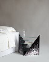 A sharp-edged nightstand by Rafael de Cardenas and Evan Gruzis, made from paint, MDF, and glass, puts everything on display.

Don't miss a word of Dwell! Download our  FREE app from iTunes, friend us on Facebook, or follow us on Twitter!