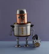 The Pots-and-Pans Robot is one of my favorite projects in the book. It's cobbled together from cookware items past their prime, a couple of candlesticks, and some hot glue.