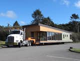 A Balance Large module makes its way to its site on the Washington coast.  Search “ahead its class” from Mark Rylant of Method Homes