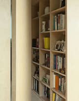 Yates used the same medium density fiberboard on this bookshelf as she did on the wall in the kitchen.