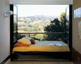 On a hilltop in Sonoma, California, the House in Dry Creek Valley by Fernau & Hartman Architects overlooks wine country's rolling hills and valleys of vineyards. It'd be hard to beat waking up to this view of the countryside.

Photo by John Linden.  Photo 4 of 8 in Nature Framed by Miyoko Ohtake