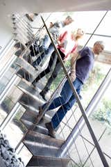 Minarc intentionally used materials commonly used in industrial settings and declined to paint over it. Their strategy made the home low-maintenance, perfect for the six members of the family, three dogs and an ever changing roster of foster pets who would call it home.