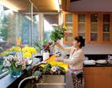 Kitchen and Wood Cabinet Fashandi arranges flowers and greenery for Persian New Year, which is a celebration of spring.  Search “greenery-are.html” from Family Matters