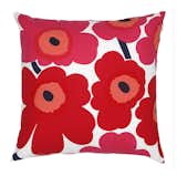 In 1964, Maija Isola designed Marimekko's most popular and most recognizable pattern in its collection. Unikko, which means poppy, follows Ratia's unconventional vision of presenting bold, bright patterns to the public. This pillow, sold at Marimekko Shops at select Crate and Barrel locations and at crateandbarrel.com, feature the Pieni Unikko print, which is a middle print between the original Unikko pattern and Mini-Unikko.
