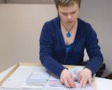 In the color-selection room, Taina Tiilikainen thumbs through swatches to help designers pick the perfect combinations
