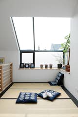 The tatami room (pictured) has mats from the Futon Company and a “Hinamatsuri” mobile adds a cheery touch.