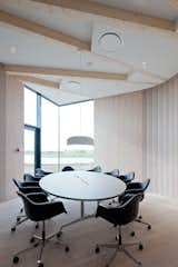 Each meeting room has a floor plan in the shape of a cow’s ear or leaf, all of them slightly different in shape, size and material.  Photo 7 of 10 in Modern Meets Historic in Denmark by Jaime Gillin