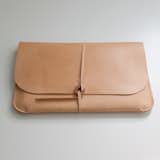 10. Laptop portfolio by Kenton Sorenson. "We own one of each of Kenton Sorensen's leather works. Each piece is made by Kenton himself in his studio in Wisconsin. His laptop case is particularly beautiful: when you open it up there is a place to hold a single pen, a notebook, and your laptop. As Kenton always says, 'The modern man travels light.'"