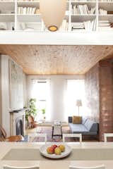 Living Room, Sofa, Pendant Lighting, and Standard Layout Fireplace Still, it’s possible to remove or relocate non-structural walls in a home with good bones.  Photo 6 of 9 in What it Really Means When a Home Has Good Bones from New Prospects