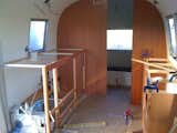 Here's the new layout, with furniture being built in.  Photo 6 of 16 in Camping Trailer by Rain Worx from Big Sur Airstream Renovation
