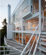 The rear facade is a complex articulation of angles and walkways.