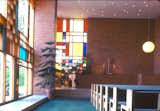 Blocks of color in the stained glass windows and decidedly more sober brick are the dominant materials of the main sanctuary of Midland's First Methodist Church.