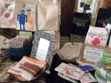 Signs with green tips speckle the store, like this one about reusable lunch bags that sits next to fabric sandwich bags and lunch totes by Graze Organic and Rebel Green.  Photo 8 of 12 in Kristi Reimers of Eco Carmel by Miyoko Ohtake
