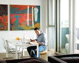 The clean lines and, in Loft R's case, balcony with a view of downtown's skyline suit Robert Vanselow's urbane sensibility. "This was spot on," he says.  Photo 7 of 13 in Loft by Dana Barnes from Robert Vanselow, Loft R