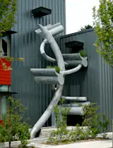 "Thornton Creek" by Stephen Glassman
This steel sculpture literally serves to revive Thornton Creek, lost to urbanization. The reclaimed pipes were peeled open and now convey water from the rooftop of Fire Station 39 to an underground cistern, watering switch grass within the sculpture along the way, a literal throwback to the area’s past. The arms “float,” giving an organic quality to a rugged piece.
Photo by Stephen Glassman