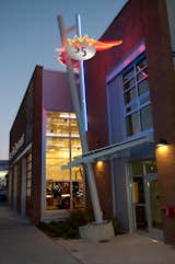 "Rescue" by Kay Kirkpatrick

The abstracted ladder pushes away from the new Fire Station 35 as a reference to the rescues firefighters perform daily. Surrounding the playful “35” sits a neon crown of fire, both an obvious tie to a firefighter’s main adversary and also as a play on the building’s 1950s-style architecture.

Photo by Peter de Lory