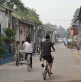 Shahid captured this image while "cruising through a hutong" in Beijing. Hutongs are Beijing's narrow streets and alleys that are sadly slowly disappearing to make way for new roads, which you can read about in our "Protect and Conserve" article in the June 2010 issue, if you've got it handy.