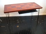 Re-paint the sawed-off edge, and ta-da! Brand new console table.

Don't miss a word of Dwell! Download our  FREE app from iTunes, friend us on Facebook, or follow us on Twitter!